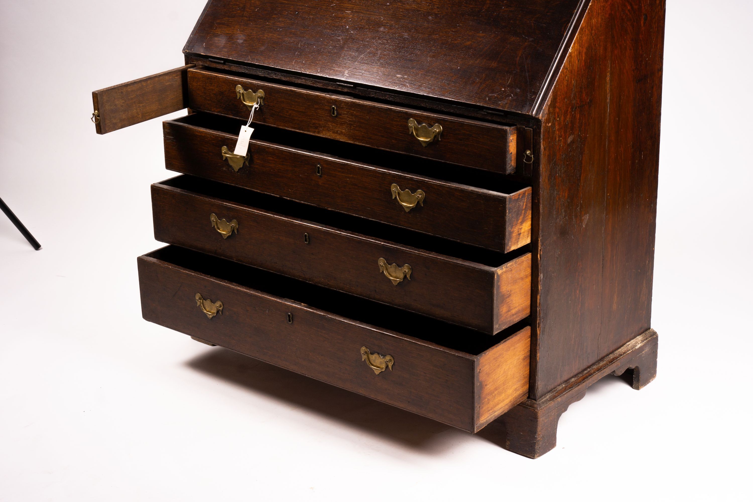 A George III oak bureau cabinet, width 108cm, depth 52cm, height 209cm